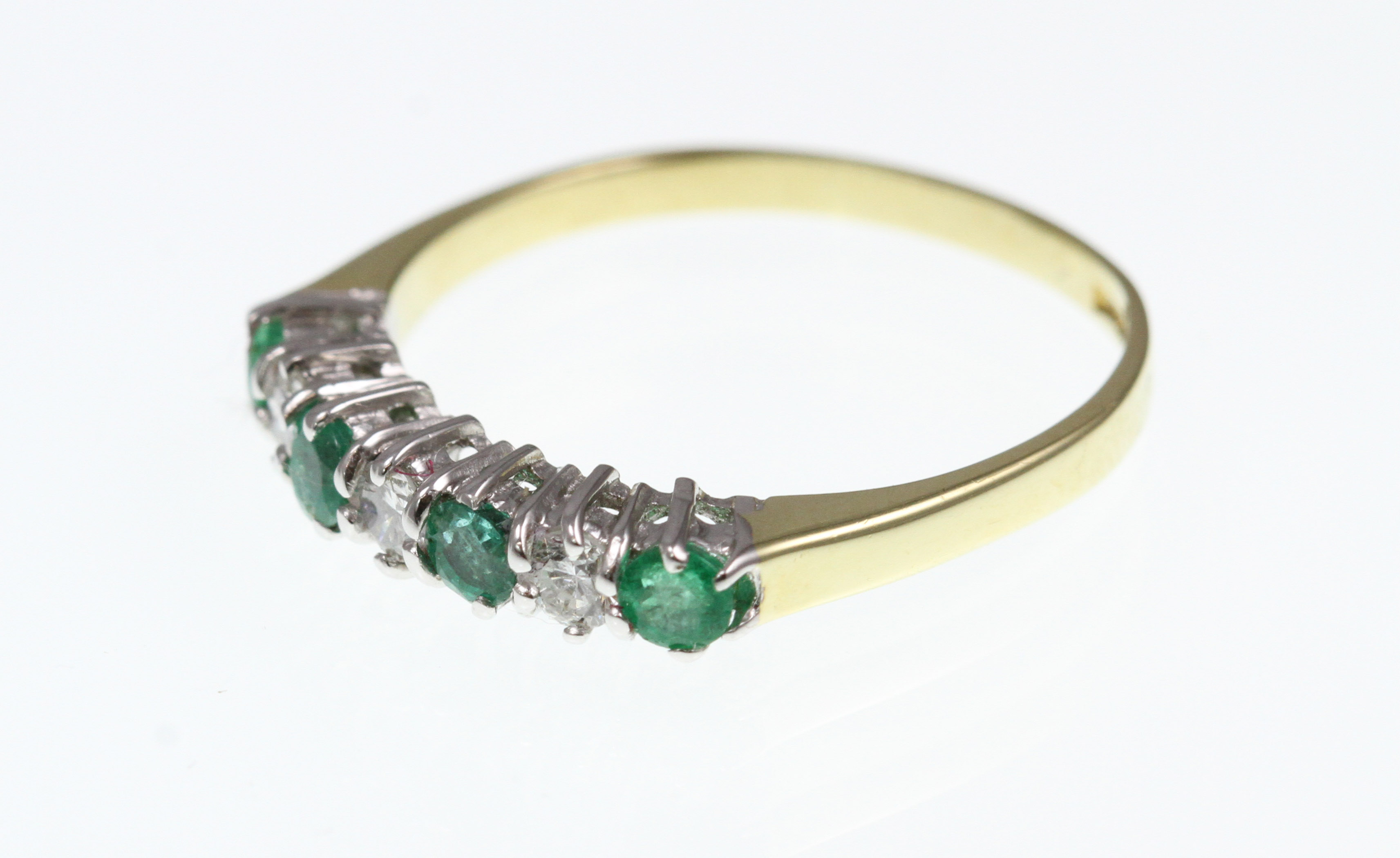 An 18ct H/M emerald and diamond 7 stone ring, approx total diamond weight 0. - Image 2 of 2