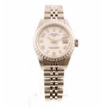 POLICE > A ladies stainless steel ROLEX oyster perpetual DATE wristwatch with white dial & fitted