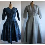 A pair of 1950s dresses labelled Bijou and Rodney. A dove grey rayon grosgrain dress by Bijou.