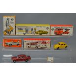 Five boxed tinplate models by CKO including a Ford Capri with Caravan and a Fork Lift Truck.