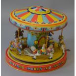 An unboxed attractively lithographed, tinplate 'Playland Merry-Go-Round' by J. Chein & Co (N.Y.C.
