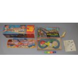 A boxed Technofix tinplate and plastic 'Loop the Loop' track together with two cars and a boxed