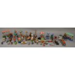 A good quantity of unboxed novelty toys of tinplate and plastic construction from a variety of