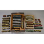 OO Gauge. 40 x assorted unboxed rolling stock. Wagons & coaches, including Wrenn Pullman coaches.