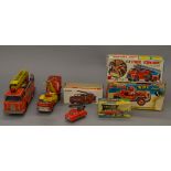 Four boxed fire related toys of tinplate and plastic construction, one being battery operated,