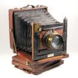 Wood and Brass whole plate field camera retailed(?) by J Robinson & Sons, 66 Grafton St, Dublin,