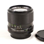 Canon FD 85mm f1.8 lens #71653 (condition 4E) with replacement caps.