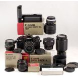 Canon A1 camera (condition 5F) with Canon 35-70mm FD Macro Zoom lens (condition 5E); Canon FD 50 f1,