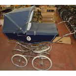 A blue Silver Cross pram