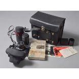 An assortment of Pentax and other camera lenses and accessories et