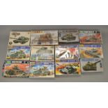 12 x Assorted military model kits, various scales & manufacturers, includes motorised kits.