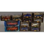 Ten boxed Maisto 1:24 scale diecast model cars together with two boxed UT Models 1:18 scale cars,