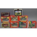 Nine boxed diecast Land Rover models in a variety of different scales by Britains,