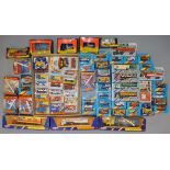 A quantity of boxed and carded diecast models by Corgi and Matchbox.