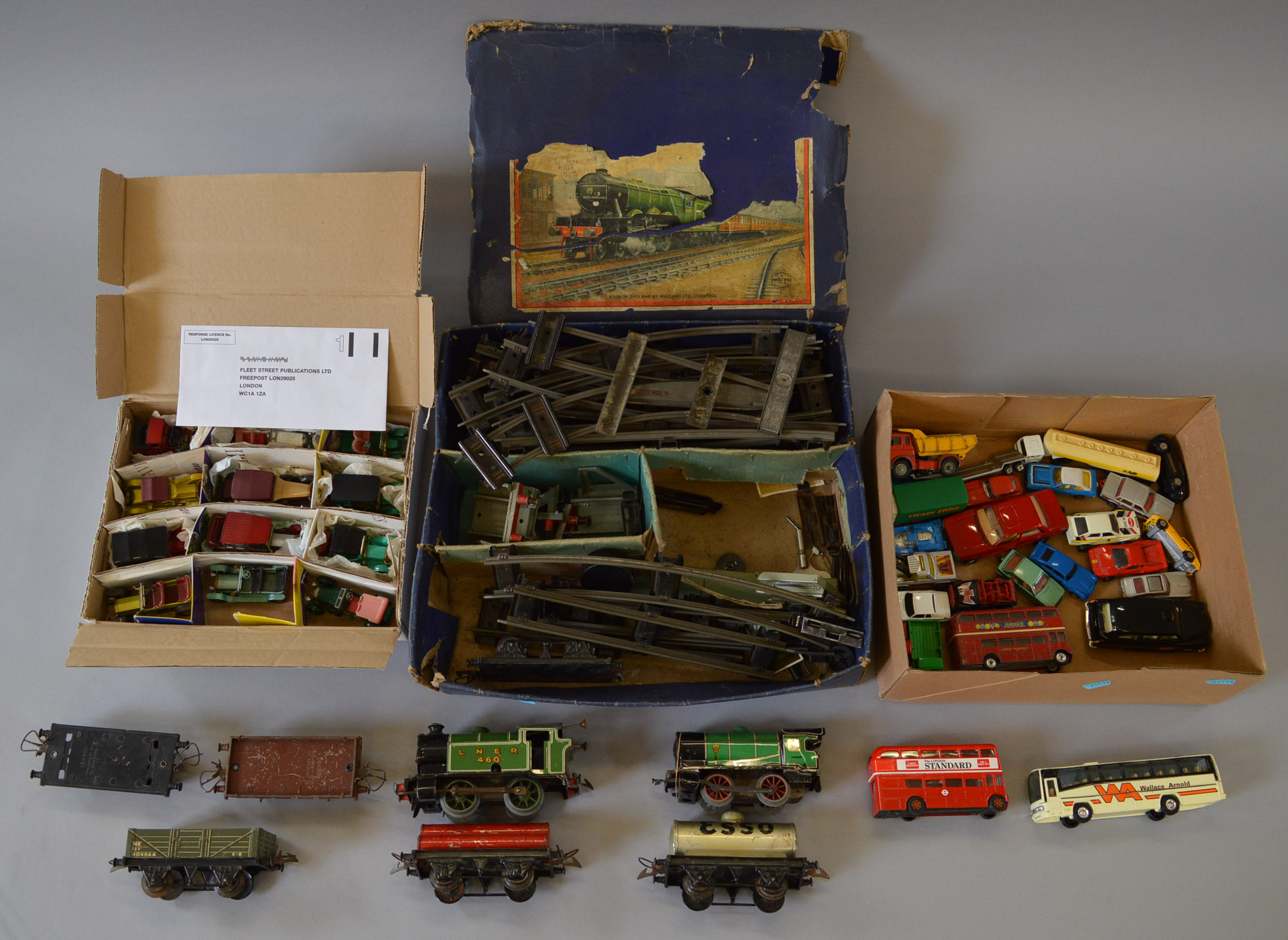 A mixed lot of toys including a boxed Hornby O Gauge train set, playworn in P box,