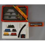 OO Gauge Hornby. GWR goods train set, missing track pieces together with boxed Golden Arrow coach.