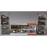 Eight boxed 'Rallye by Vitesse' diecast model cars in 1:43 scale including four different Ford
