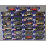Twenty seven boxed Corgi Vanguards Rally and Road cars in 1:43 scale including Lotus cars and a