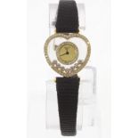 An 18ct ladies CHOPARD 'Happy Diamonds' quartz wristwatch numbered 206942/5191, working,