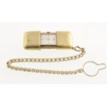 A MOVADO gold-plated Purse watch with working manual wind movement & attached watch chain marked