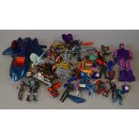 A quantity of loose, mostly Marvel X-Men toys, including Sabretooth and Storm action figures.