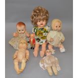 Six unboxed vintage dolls, including a 21 inch plastic doll marked 'Made in England',