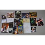 Four carded Star Wars figures each bearing signatures,