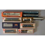 OO Gauge. 6 assorted boxed locomotives together with 4 assorted rolling stock.