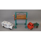 Three unboxed Tri-ang Pressed Steel toys, a Mangle on wheels, a 'Junior' Ambulance,