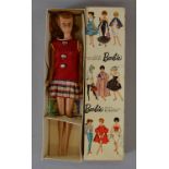 A boxed Barbie '850' Redhead Ponytail Doll with some grubbiness to outfit and discolouration to the