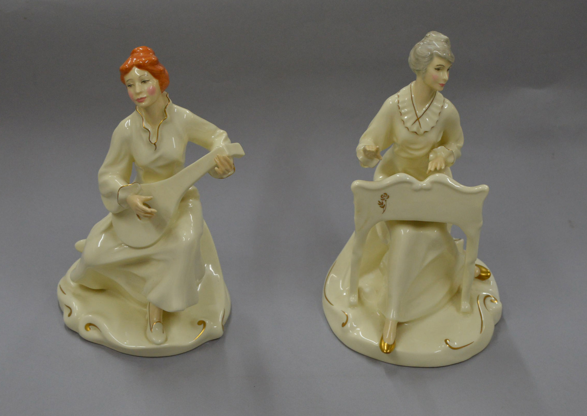 A pair of Royal Doulton Enchantment Collection figures: Musicale HN2756 and Serenade HN2753