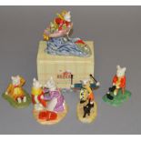 5 Royal Doulton Rupert figures: Out For The Day RB 14, Banging On His Drum RB 17,