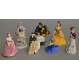 7 Ceramic figures including Royal Doulton and Royal Worcester examples.
