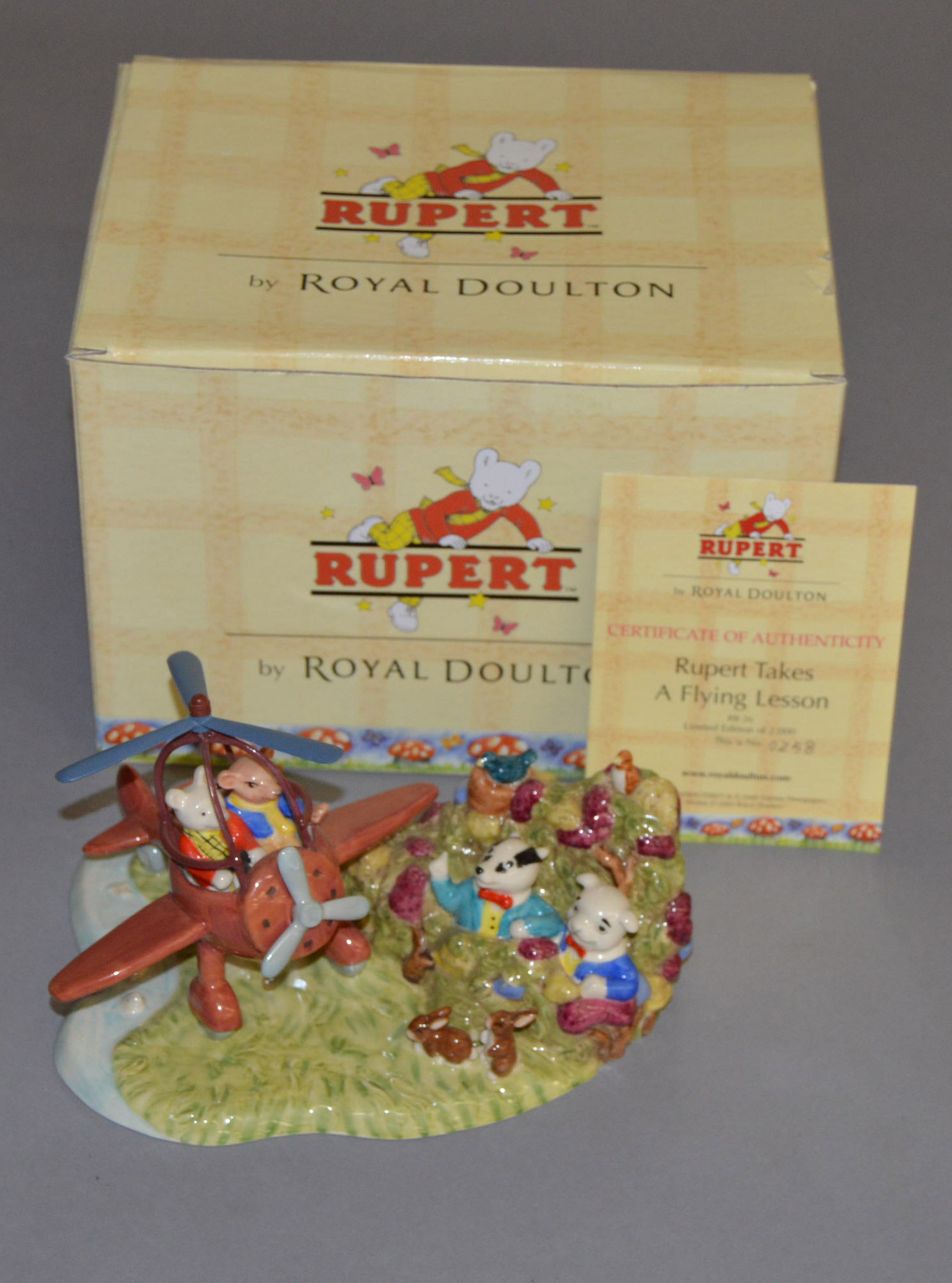 Royal Doulton Rupert limited edition figure group: Rupert Takes A Flying Lesson RB 26 258/550 (200
