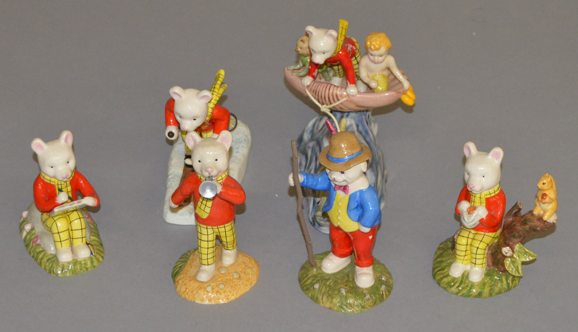 6 Royal Doulton figures: We Meant To Put Them Back RB 16, Rupert Takes A Skiing Lesson RB 20,