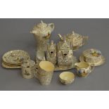 A collection of Empire ceramics all decorated in the Crinoline Lady design with ornate gilt floral