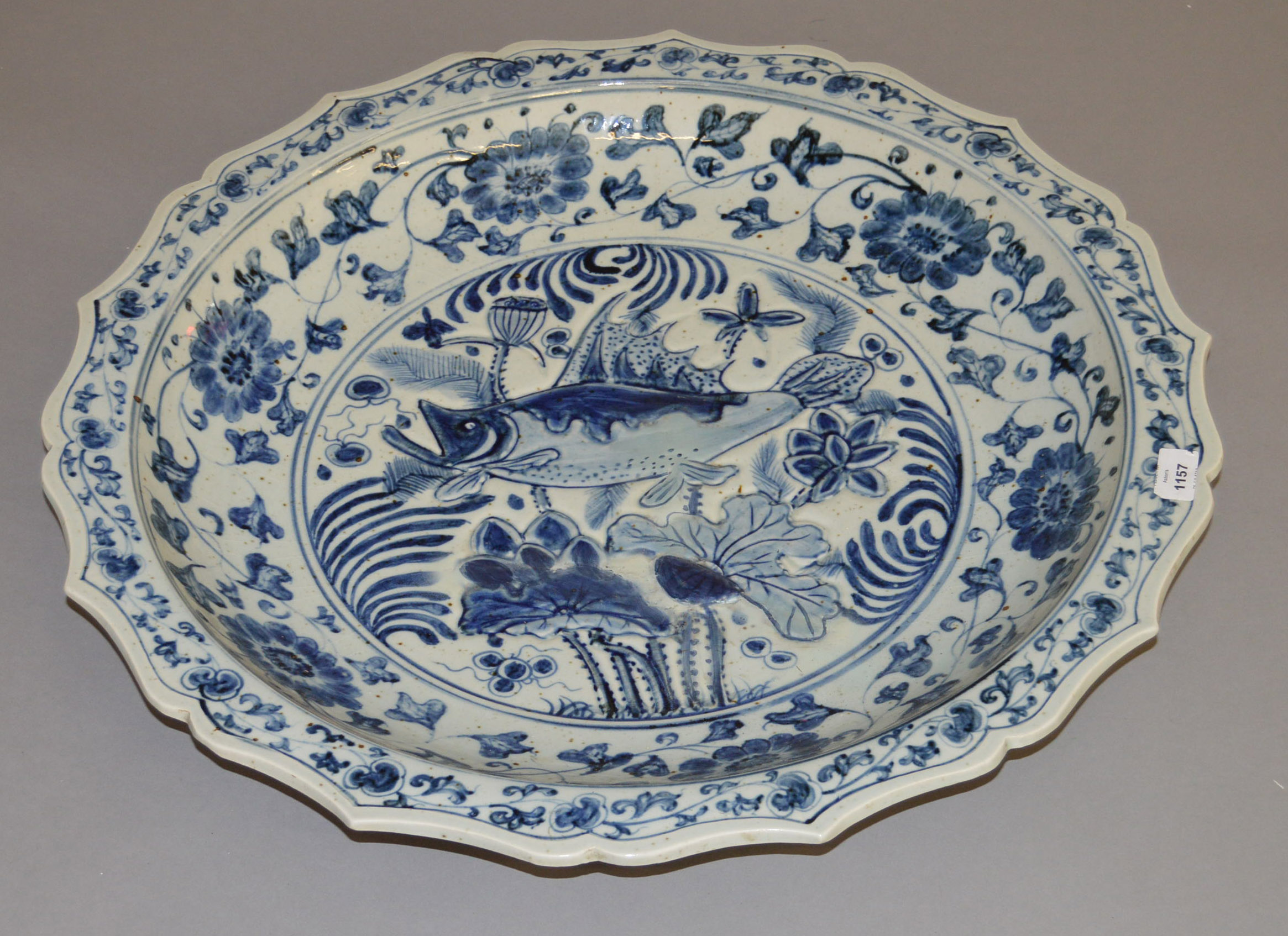 A large blue and white early 20th century bowl,with restoration. Possibly handpainted Chinese.