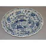 A large blue and white early 20th century bowl,with restoration. Possibly handpainted Chinese.