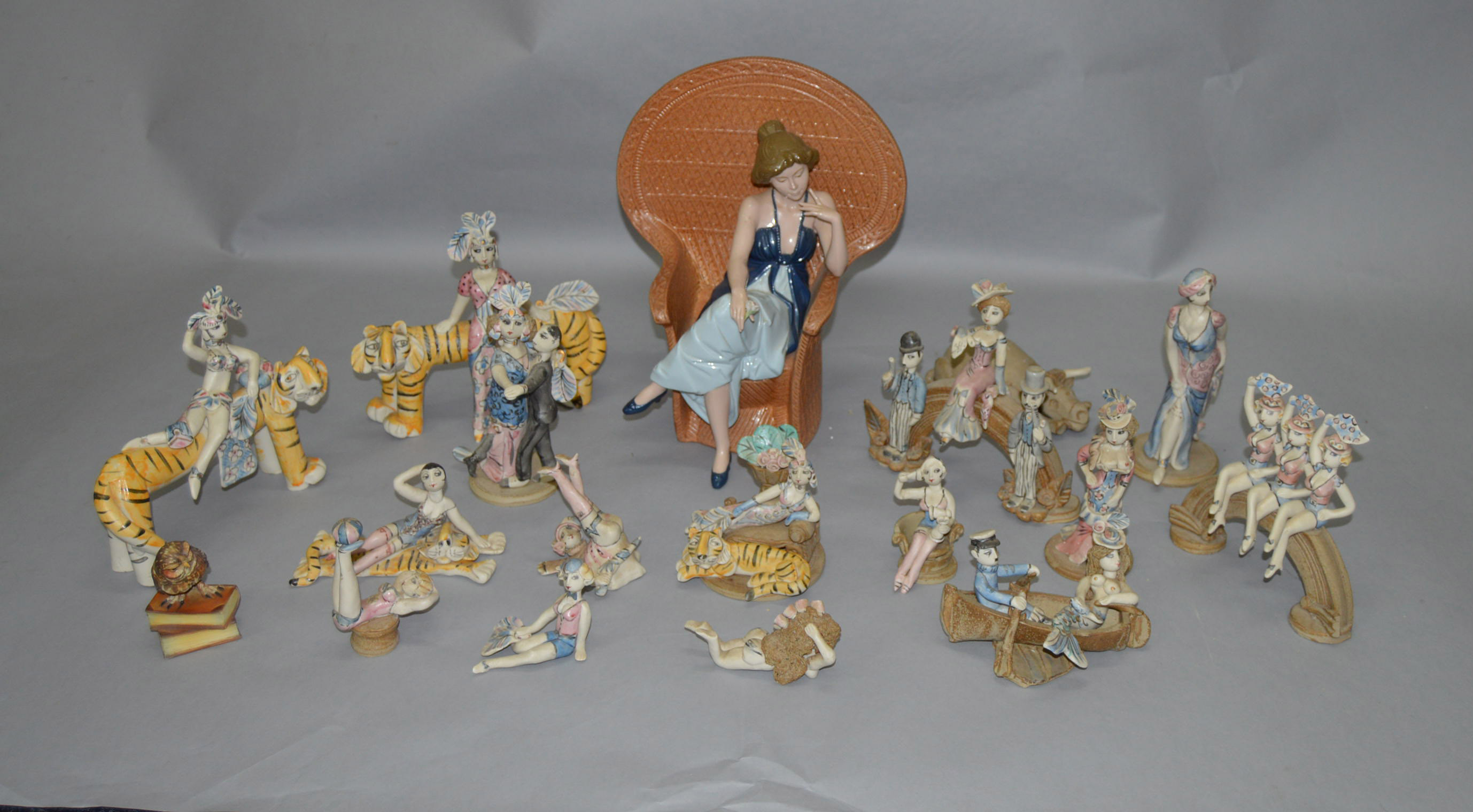 A mixed lot of studio pottery figures together with a Franklin Mint (AF) and a Nadal example.