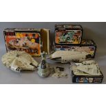 Four Kenner Star Wars Return of the Jedi vehicles: Millennium Falcon; Rebel Transport; Slave I;