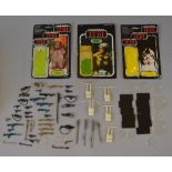 Quantity of Kenner Star Wars weapons and accessories.
