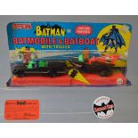 A carded plastic friction drive 'Batmobile & Batboat with Trailer',
