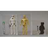 Three Kenner Star Wars 3 3/4 action figures, all AFA graded: C-3PO, AFA 85; Stormtrooper,