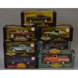 Seven boxed ERTL 'American Muscle' diecast model vehicles in 1:18 scale including a 1961 Corvette,
