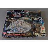 Four Star Wars plastic model kits: MPC Darth Vader,