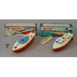 Two boxed Sutcliffe tinplate boats,