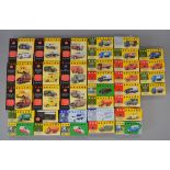 Thirty five boxed 'Vanguards' diecast car, van and truck models in 1:43 and 1:64 scale,