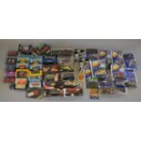 A good quantity of boxed and bagged diecast model vehicles by Corgi, Matchbox, Minichamps,