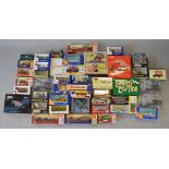 A quantity of mixed boxed diecast models by Corgi, Minichamps, Brumm, Matchbox and others.