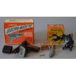 A mixed group of boxed toys, including two boxed Tri-ang Minic clockwork novelty toys,
